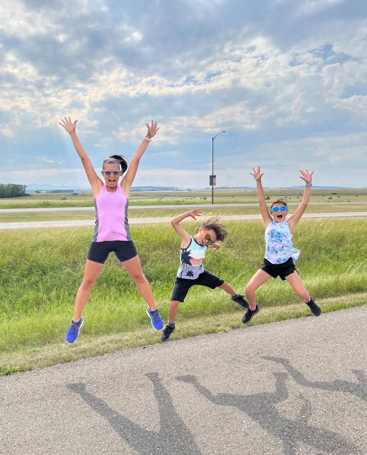 Christina and her kids jump for joy for UKC Music Miles.