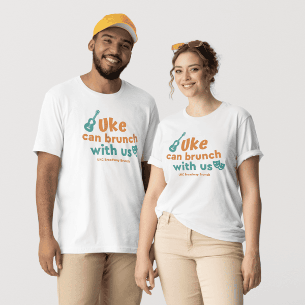 A couple modeling the official tee of the 2026 Broadway Brunch