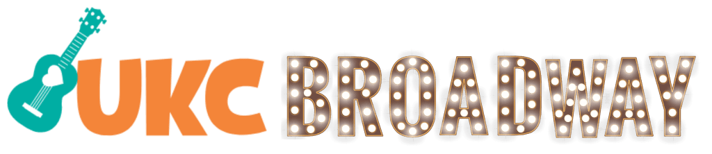 A green ukulele with the words "UKC Broadway" to the right